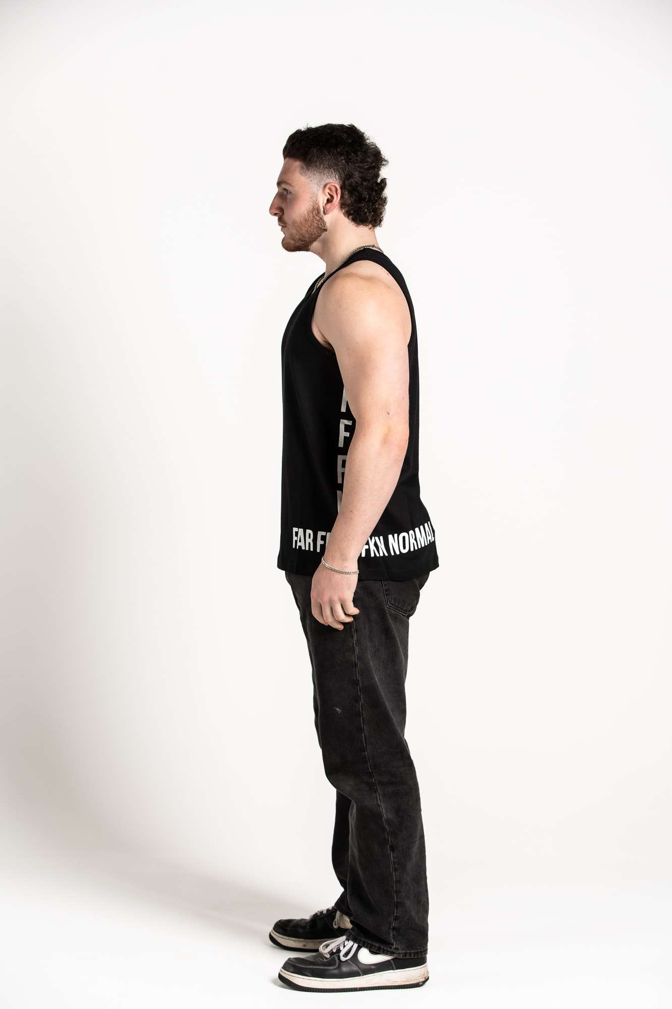 Unisex Black Side Logo Singlets on model