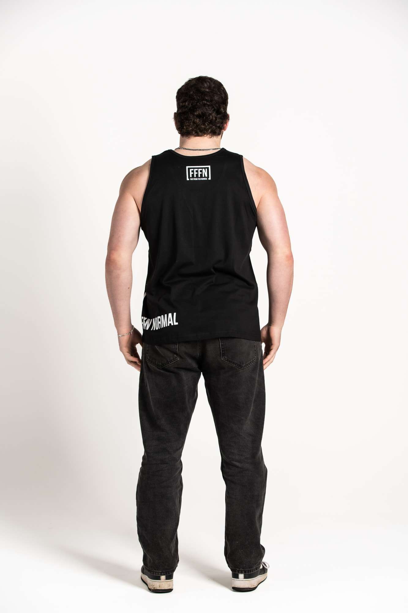 Unisex Black Side Logo Singlets on model