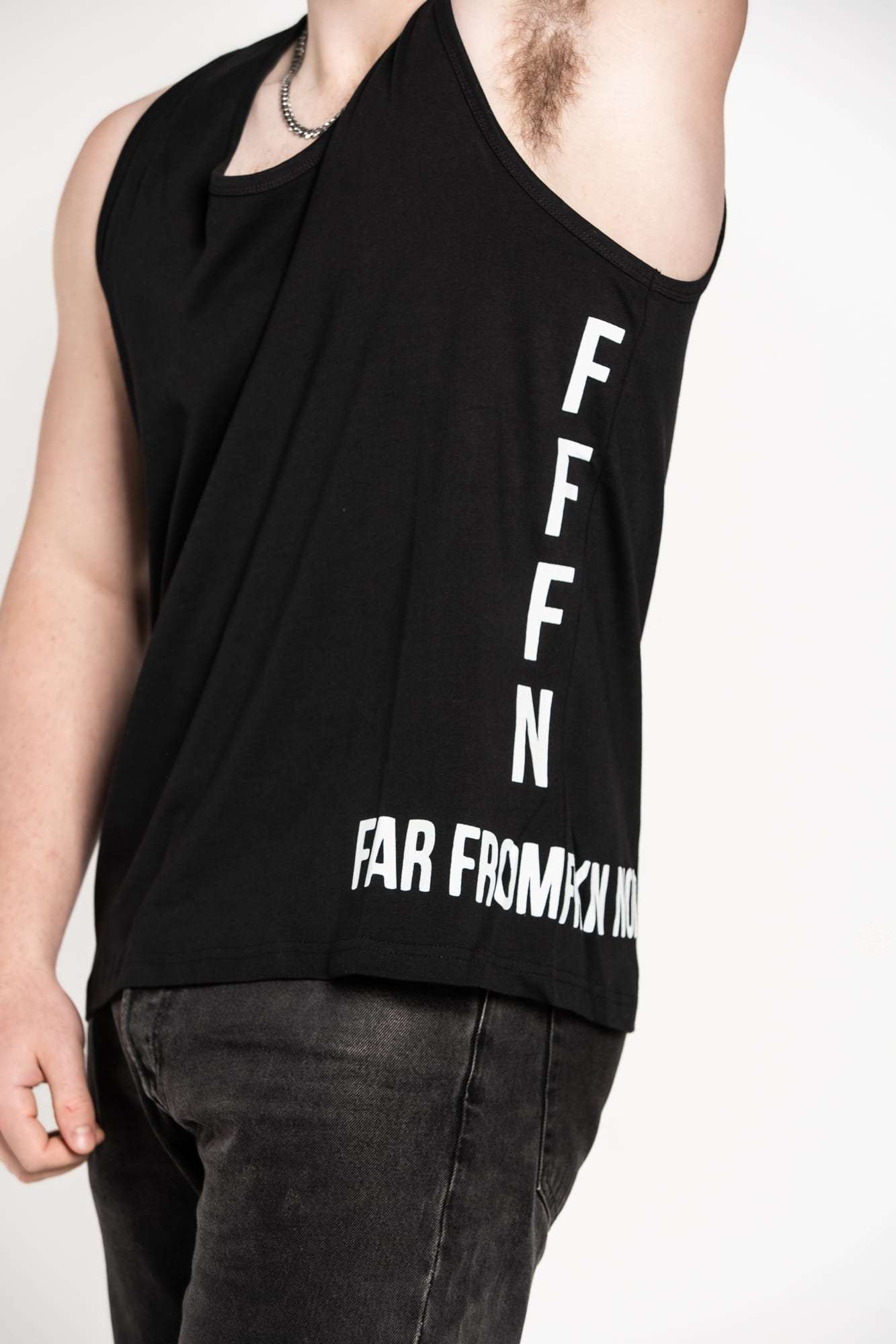Unisex Black Side Logo Singlets on model