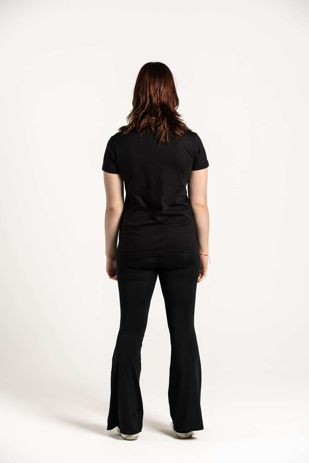 Black Unisex Front Logo T-Shirt on model [model:female]