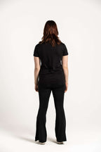 Black Unisex Front Logo T-Shirt on model [model:female]